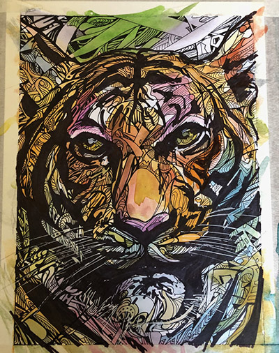 A colorful tiger made with inks, paints, and various other materials.