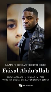 Headshot of Faisal Abdu’Allah in an art gallery with black leather jacket, in front of large painting of woman's face.