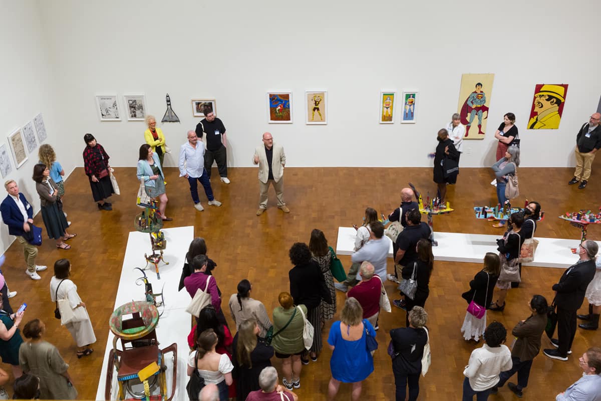 many people in art museum during reception