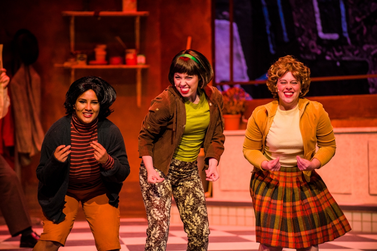 Image of performers in "Little Shop of Horrors"