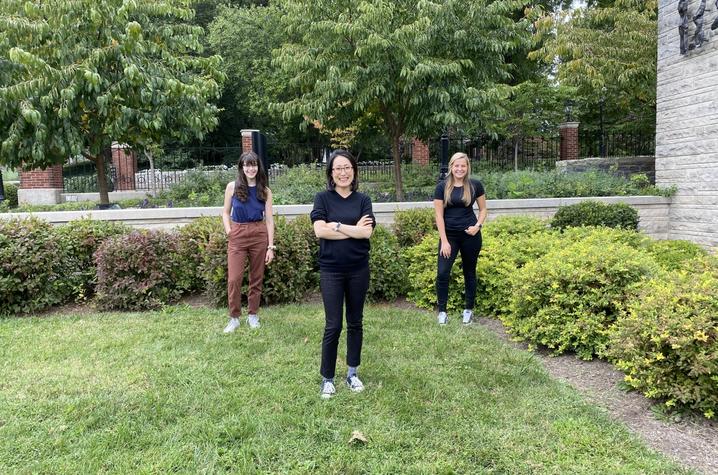 image of students with Yoon Bae outside of the Fine Arts Building