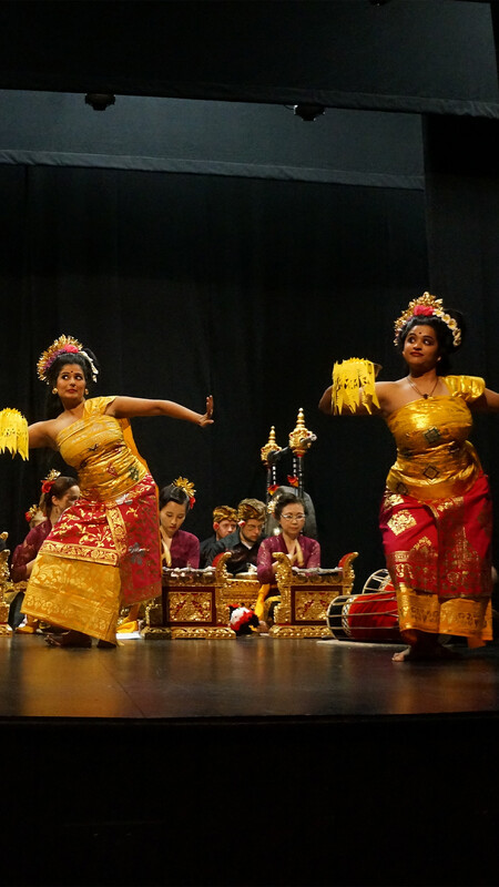 image of two Balinese dancers onstage in traditional costume