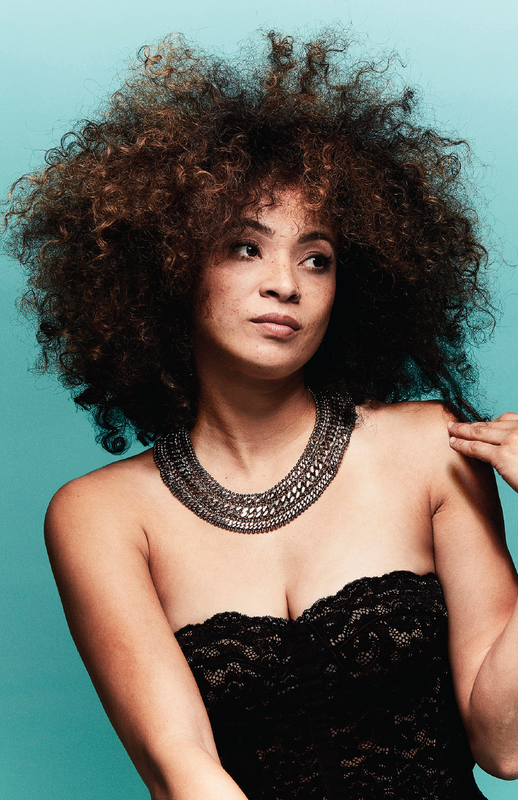 Photo of jazz musician Kandace Springs against a blue background