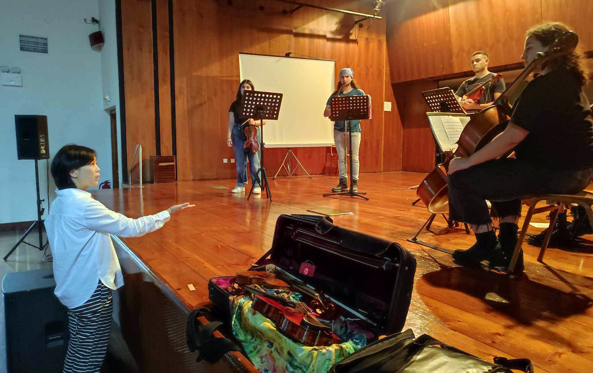 musicians on stage in concert hall