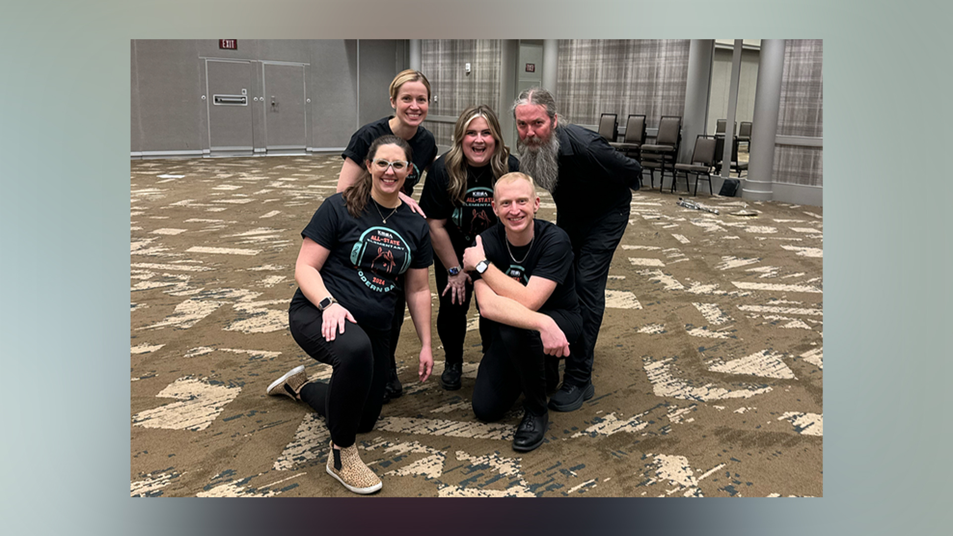 Clockwise, from back left: Martina Vasil, Taylor Ayotte, Austin Robinson, David Dockan and Kailey Holmes. This group of educators helped coordinate the first all-state elementary modern band performance at the '24 KMEA conference. Photo provided.