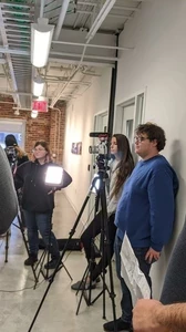 Image of students and faculty working on filmmaking.