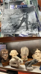 Image captions:  James “Son Ford” Thomas sculptures, collection of Linda and George Kurz.  David Farris, Untitled, ink on Herald Leader sports photographs. Courtesy of the artist.