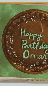 cake with Happy Birthday Omar in print