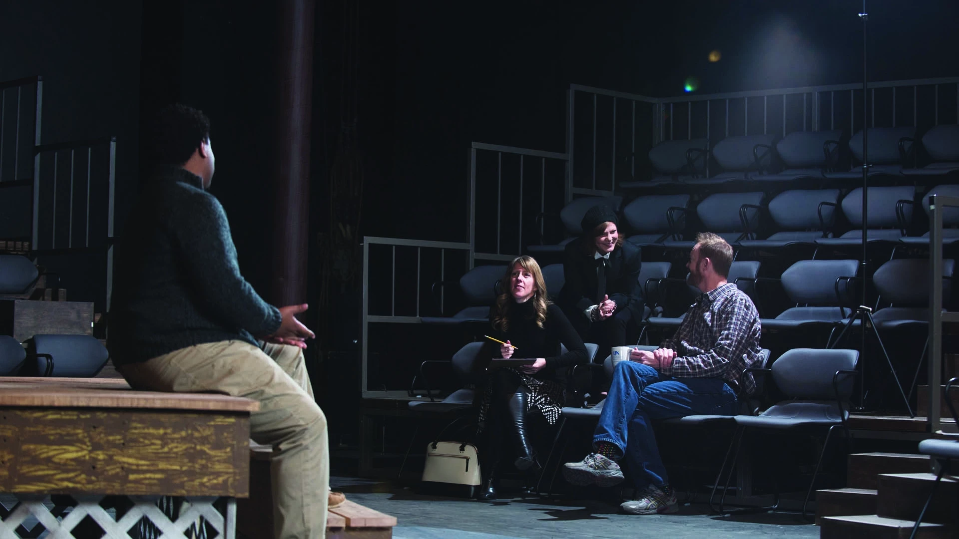 people talking in theater