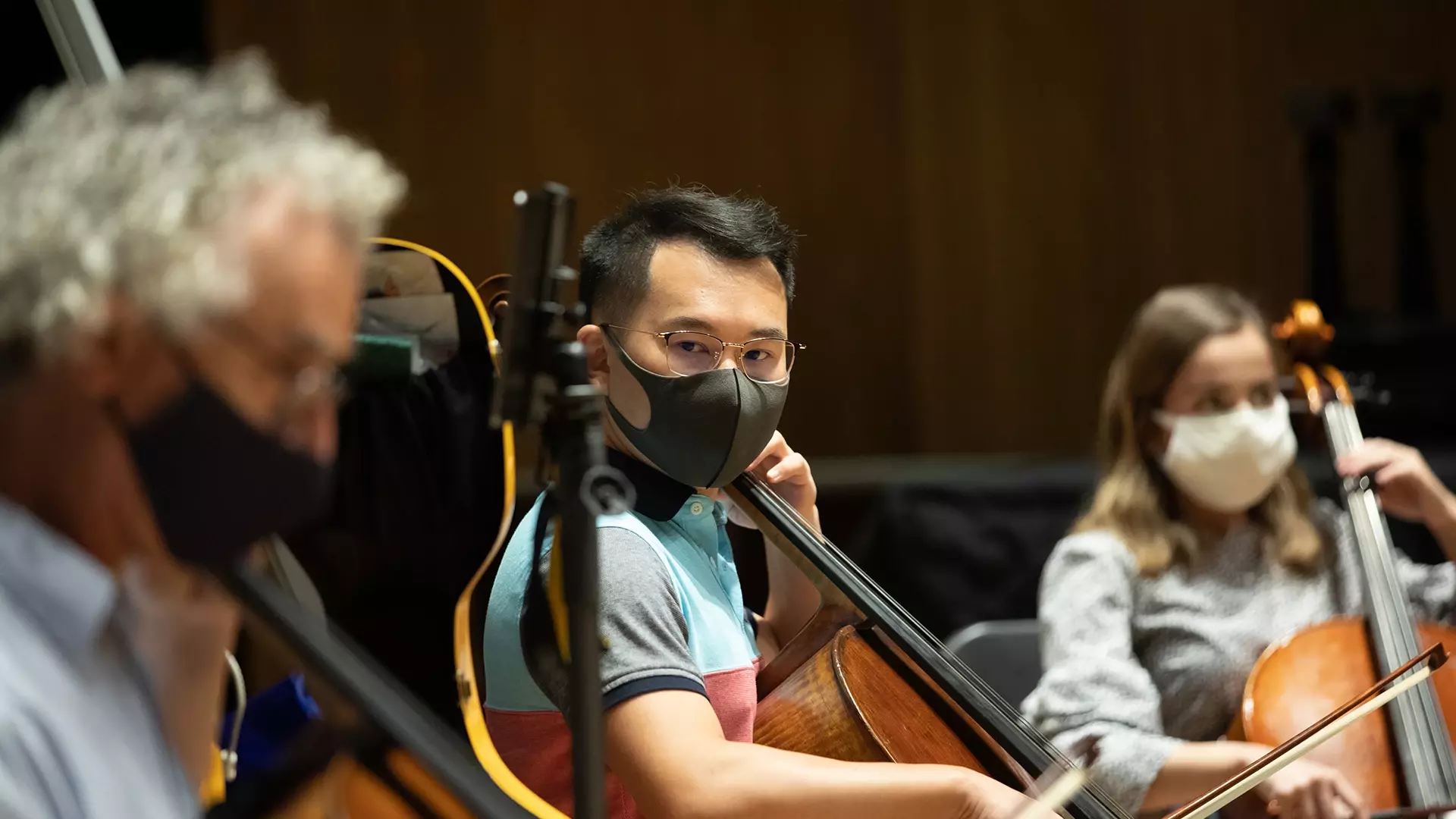 Faculty and students cello students masked