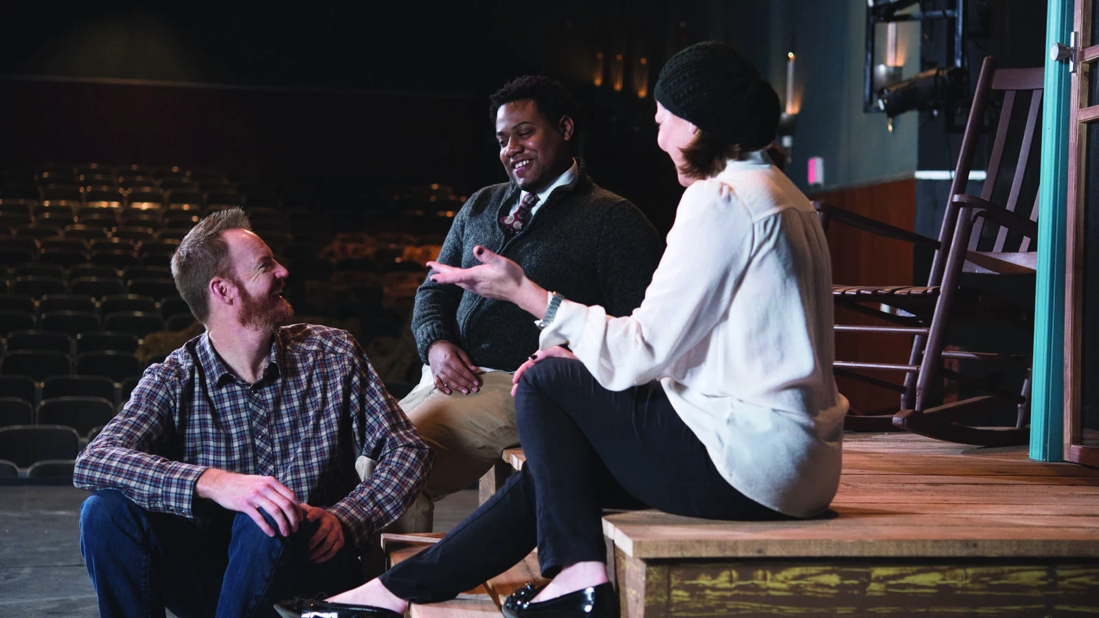 group of students sitting on stage