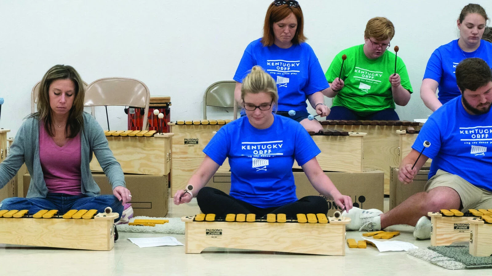 Teachers playing xylophones