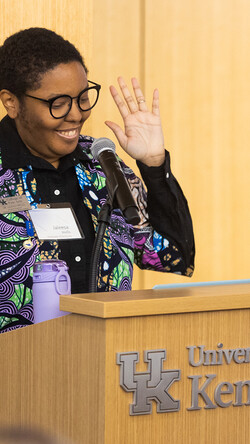 Jaleesa Wells, Ph.D,, speaks to attendees at the inaugural Women’s Perspectives in Arts Administration Symposium in 2024. Wells is the symposium organizer and an assistant professor of arts administration at UK. Arden Barnes | UK Photo