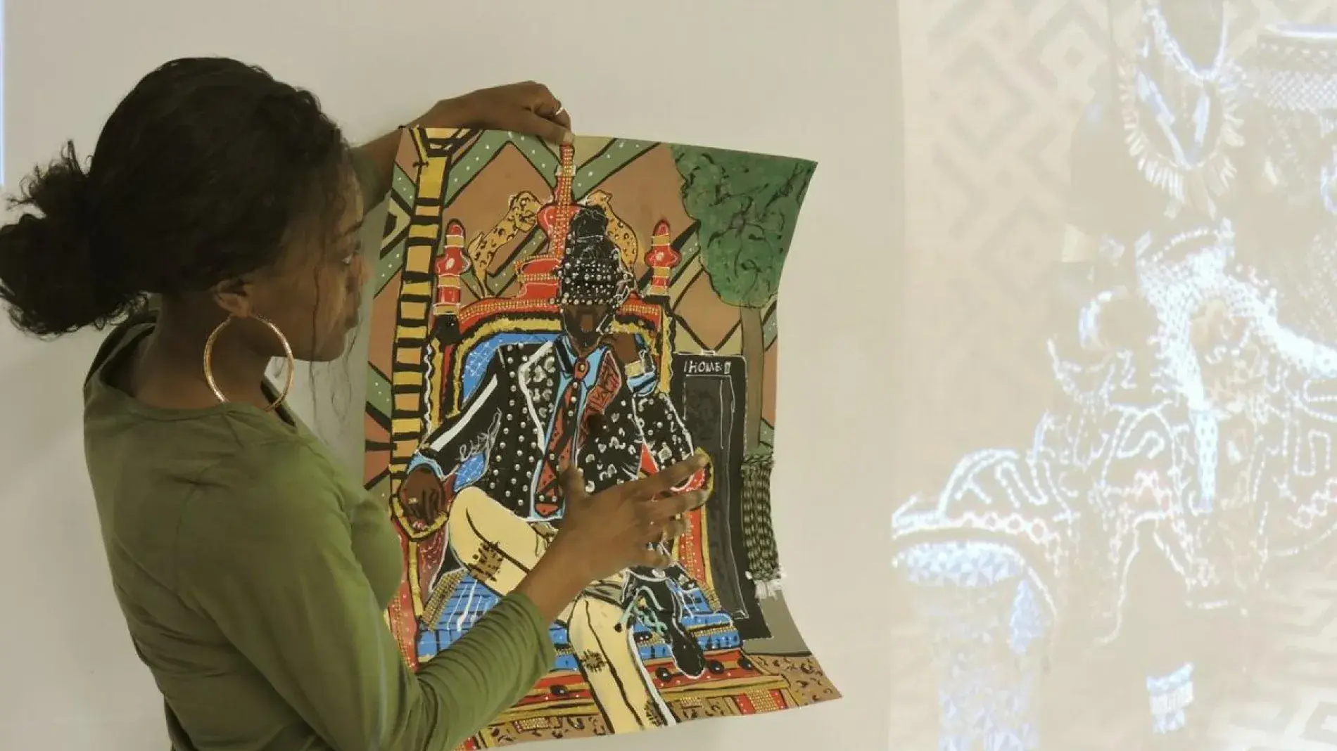 Student looking at art