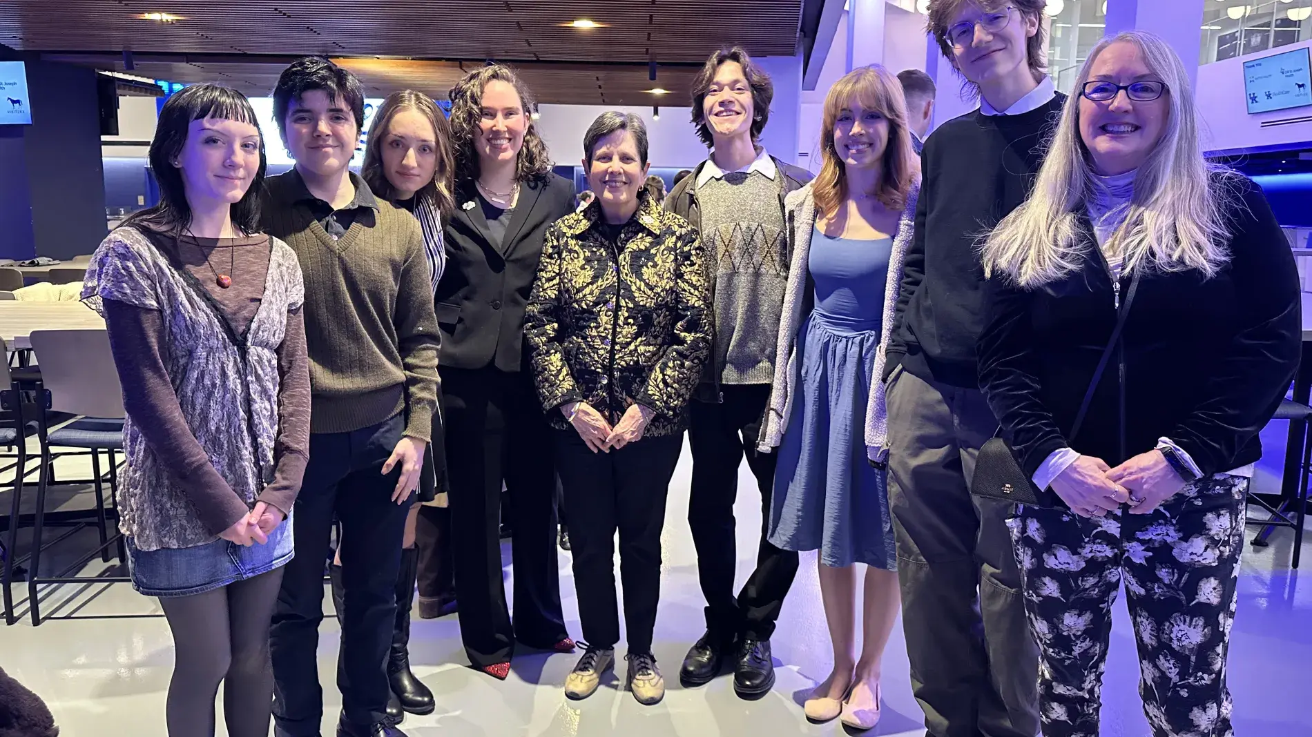 Students from the SAVS Public Art class pose with Mayor Linda Gordon at the unveiling of the mural
