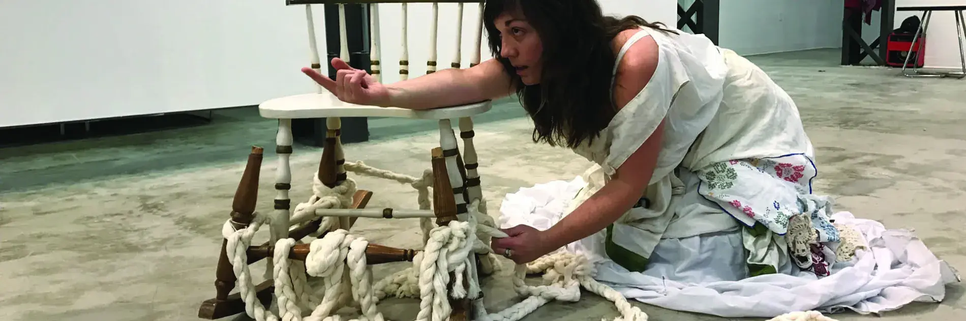 person on floor in performance art piece
