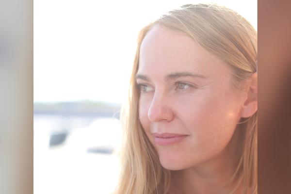 Image of Crystal Gregory, blonde female looking off to the left