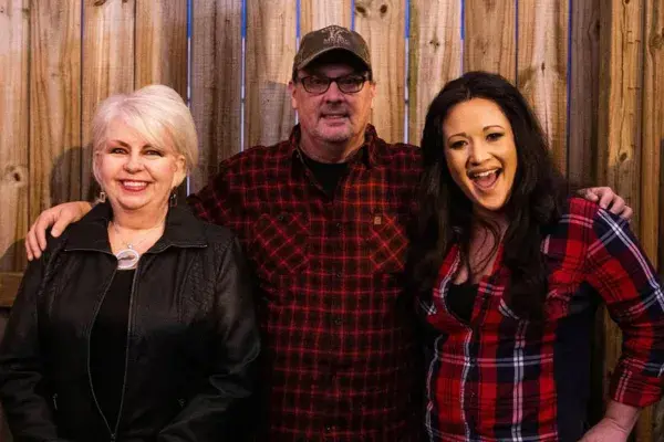 Image of Renee Cobb, her husband Warren Cobb, and co-host Rachel Crowe.