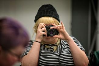 Person with camera pointed at camera