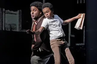 UK alumnus Chris Kenney as Chester and Walter Russell III as Char'es-Baby in Terence Blanchard's "Fire Shut Up in My Bones." Photo: Ken Howard/Met Opera.