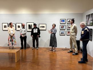 people gathered in art gallery