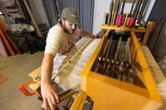 Mitchell Burleson on loom