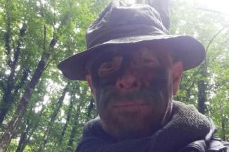 Paolo Visonà during a solo reconnaissance of the wall that indicated the Roman army line. He is wearing camouflage paint to avoid being seen by potential looters. Photo provided by Paolo Visonà.