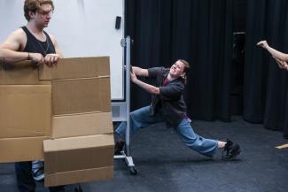 Students rehearse for the fall touring company in the black box theatre 