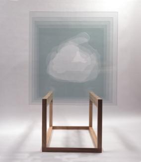 sculpture with glass etching titled layored temporarility