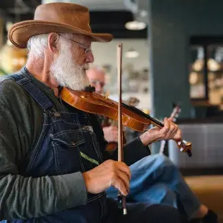 Ron Pen playing the fiddle