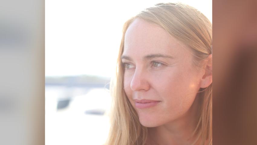 Image of Crystal Gregory, blonde female looking off to the left