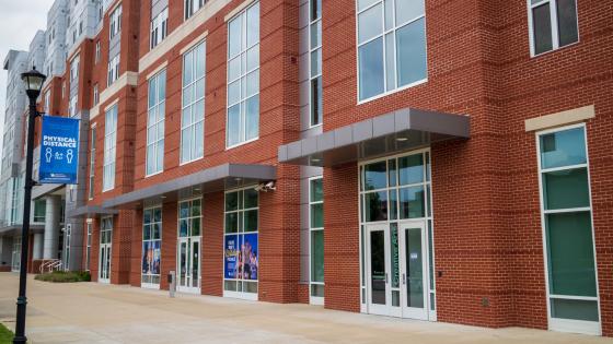 One of the exterior sets of entrances of Holmes hall on Avenue of Champions.
