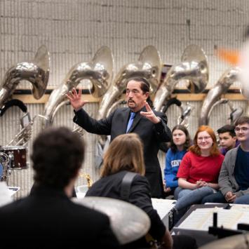 Miles Osland directs the UK Jazz Ensemble in a concert for Scott County High School. Mark Cornelison | UK Photo.