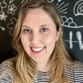 ashley worley looking at the camera on black and white background