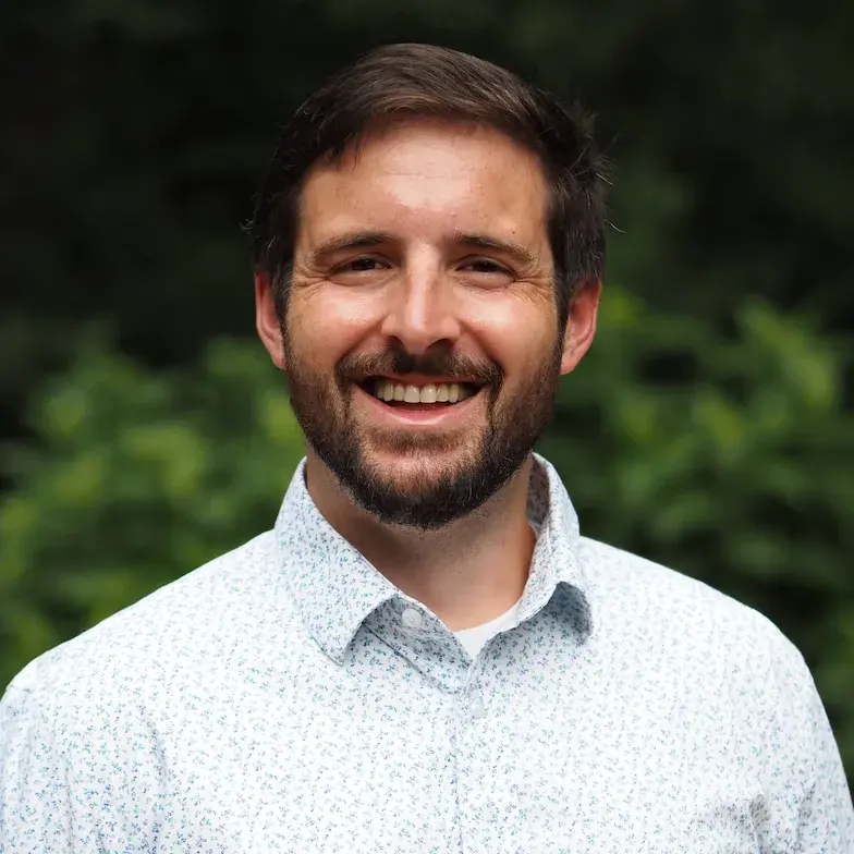 Headshot of Micahel DeWhatley